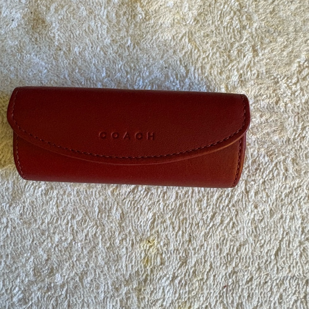 Coach Red Leather Clamshell Lipstick Case Hardshell with a mirror snap closure